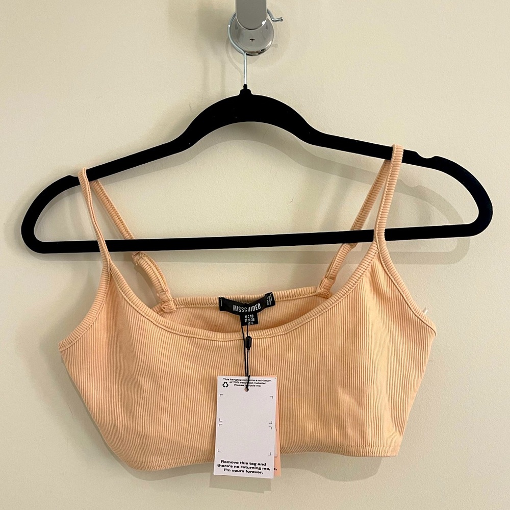Peach colored cropped top. Never worn